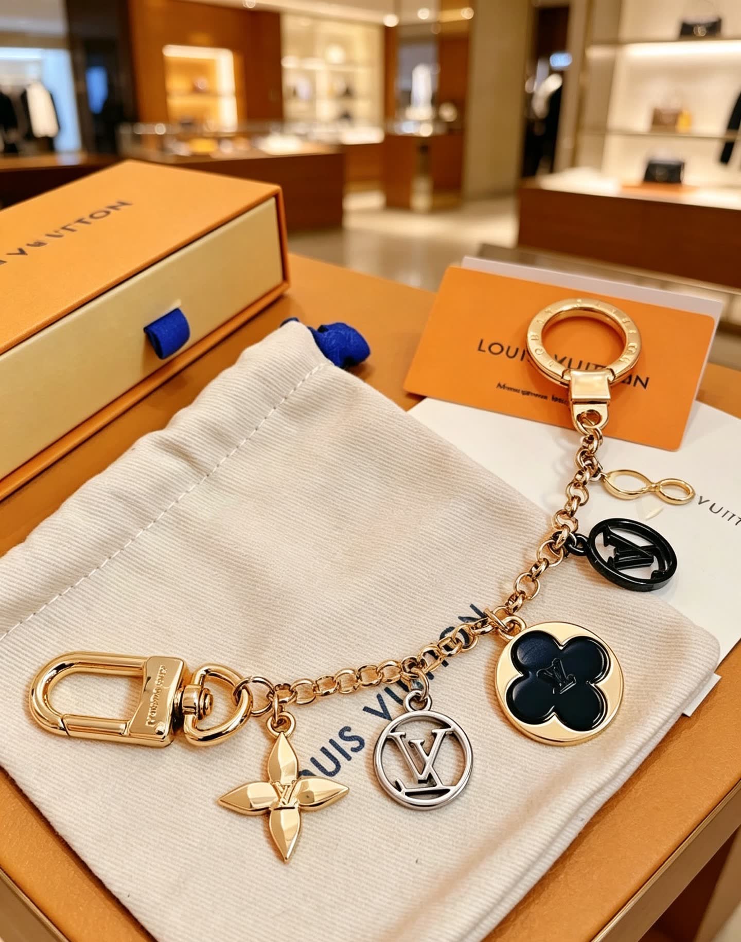 Louis Vuitton Keychain with Monogram Charms Louis Vuitton Keychain with Monogram Charms